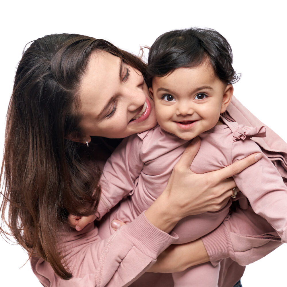 Mother and baby with NeonateCare products