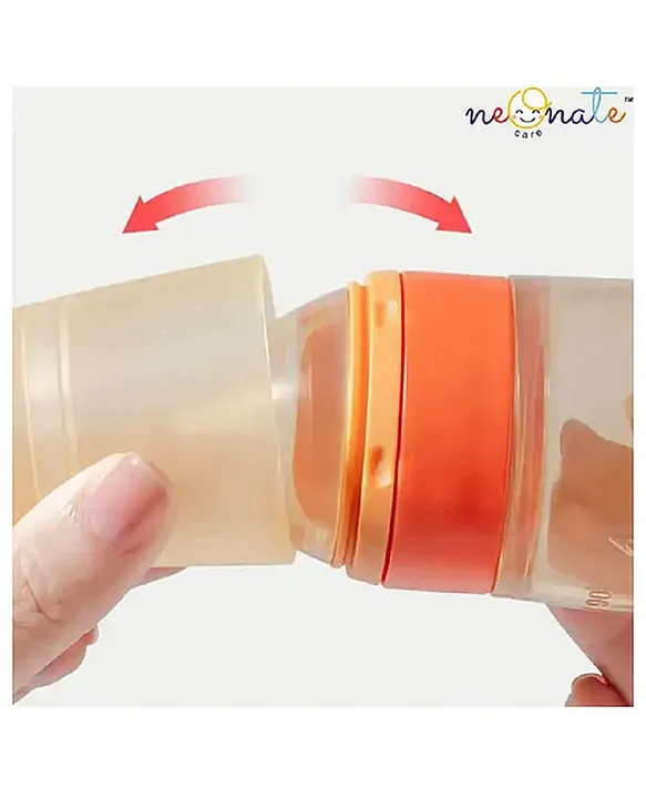 Baby Ring Style Food Fruit Feeder Nibbler and Spoon Feeder - Pink ( color and design may vary)